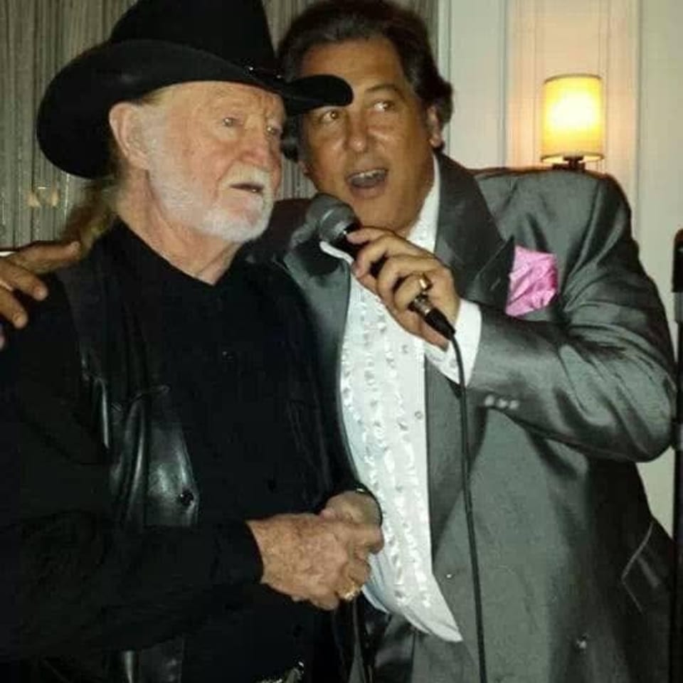 Craig singing alongside a guest